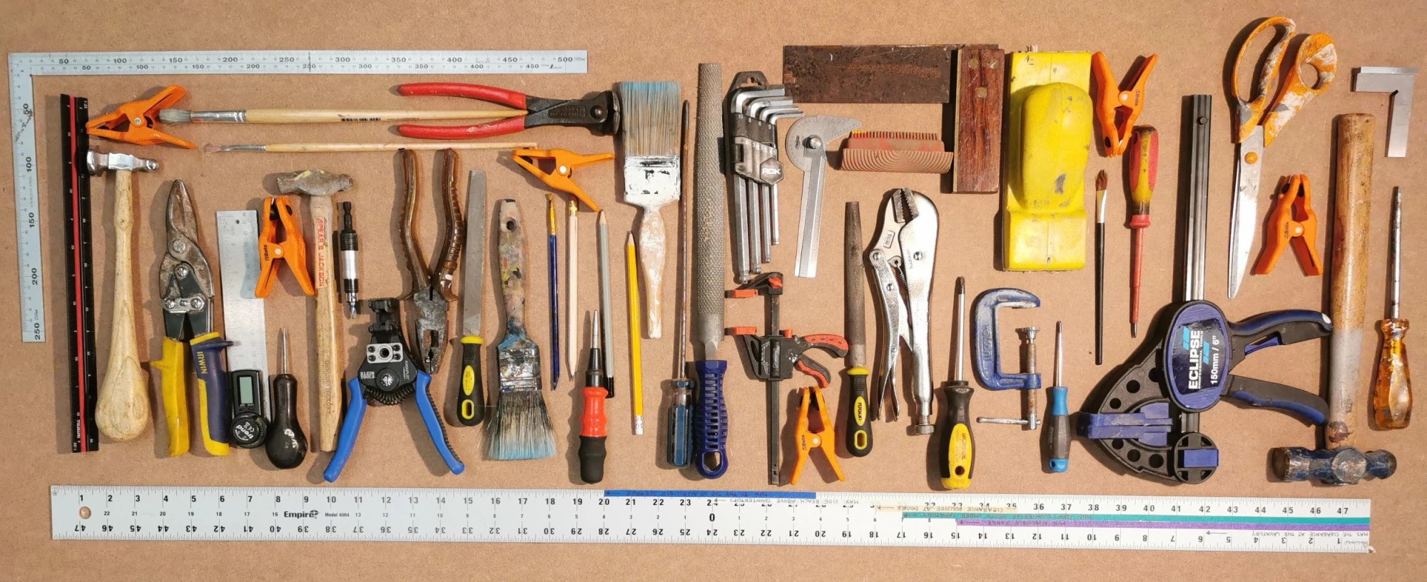 Various tools laid out flat and photographed from above.