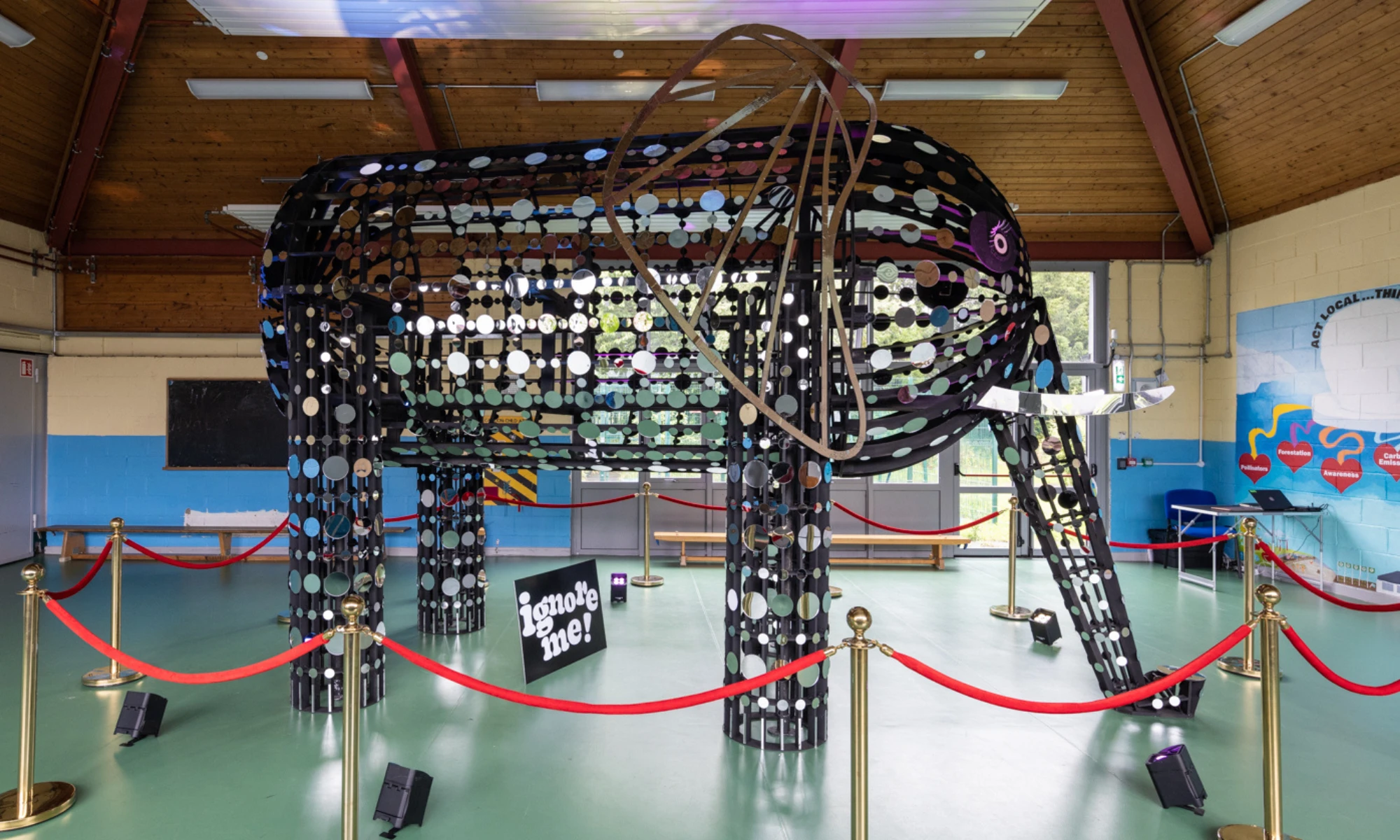 Photo of lifesize elephant sculpture in school gym