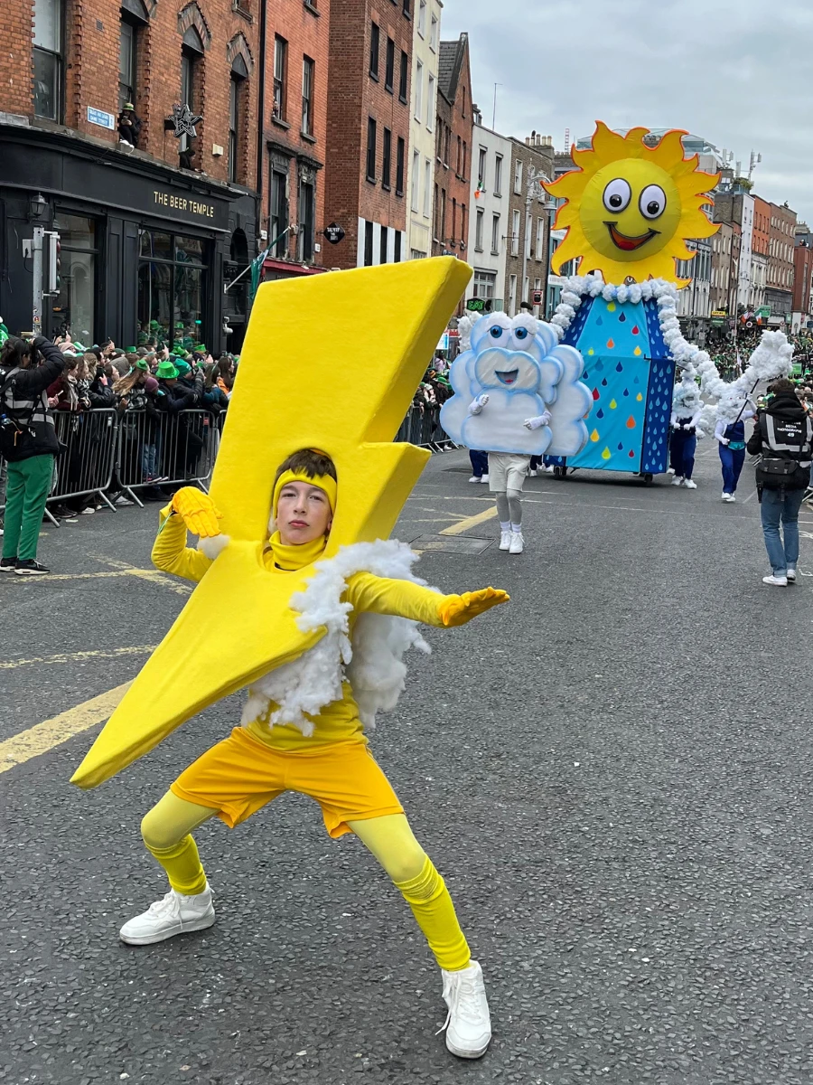 Photo of boy in lightning costume at St Patricks Day Parade 2025.